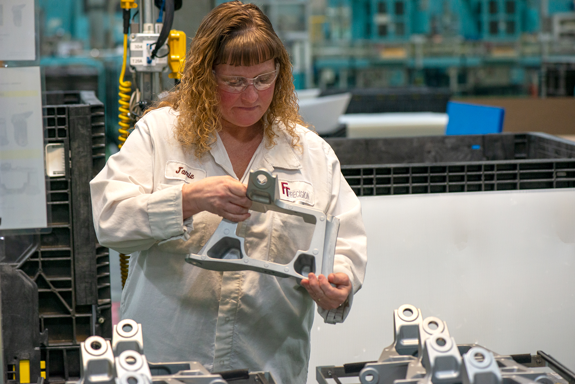 ft-precision-high-precision-cnc-machining FT Precision employee working on high precision cnc machining